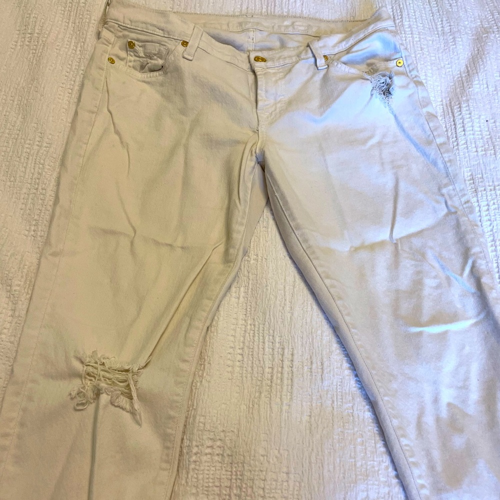 Women’s Seven white distressed denim.